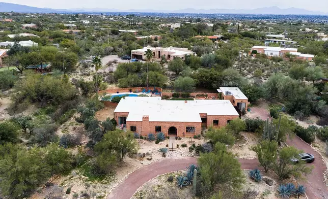 The home of Nancy Guthrie, the missing mother of “Today” show host Savannah Guthrie, is seen from above, Thursday, Feb. 5, 2026, in Tucson, Ariz. (AP Photo/Caitlin O'Hara)