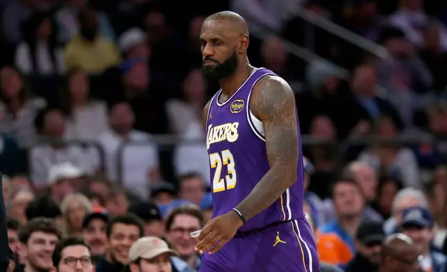 Los Angeles Lakers forward LeBron James walks up court during the second half of an NBA basketball game against the New York Knicks, Sunday, Feb. 1, 2026, in New York. (AP Photo/John Munson)