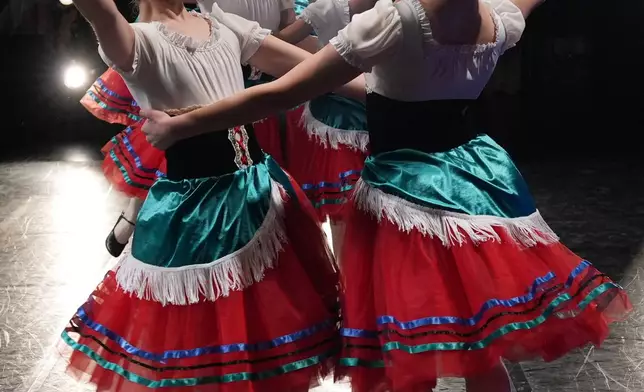 FILE - Dancers perform Tarantella Napoletana for Ensemble Competition during the Youth America Grand Prix (YAGP) Semi-Finals at Dominican University Performing Arts Center in River Forest, Ill., Feb. 8, 2026. (AP Photo/Nam Y. Huh, File)