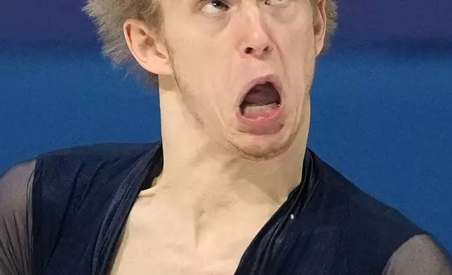 FILE - Italy's Daniel Grassl competes in the figure skating men's team event at the 2026 Winter Olympics in Milan, Italy, Feb. 7, 2026. (AP Photo/Francisco Seco, File)