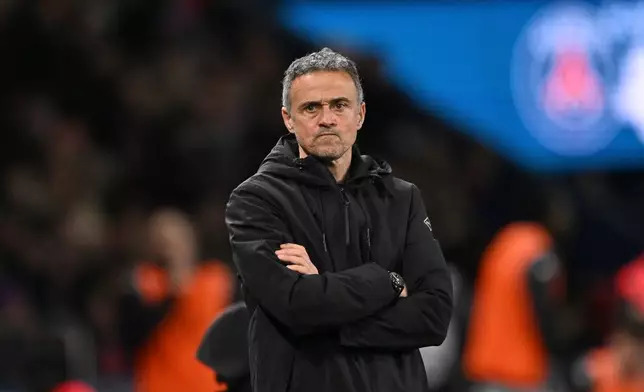 PSG's head coach Luis Enrique reacts during the French League One soccer match between Paris Saint-Germain and Metz in Paris, France, Saturday, Feb. 21, 2026. (AP Photo/Emma Da Silva)