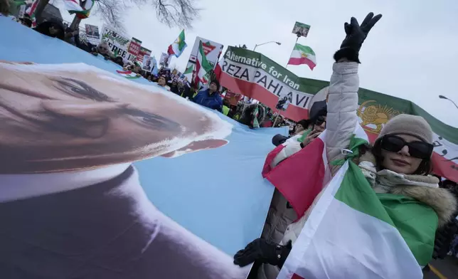 Supporters of Iran's exiled Crown Prince Reza Pahlavi attend a demonstration in Toronto, Saturday, Feb. 14, 2026. (AP Photo/Kamran Jebreili)