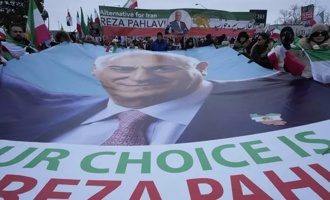 Supporters of Iran's exiled Crown Prince Reza Pahlavi attend a demonstration in Toronto, Saturday, Feb. 14, 2026. (AP Photo/Kamran Jebreili)