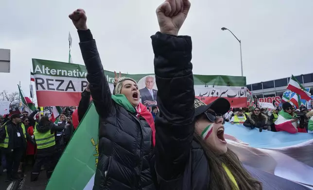 Supporters of Iran's exiled Crown Prince Reza Pahlavi attend a demonstration in Toronto, Saturday, Feb. 14, 2026. (AP Photo/Kamran Jebreili)