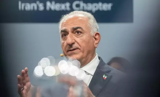 Reza Pahlavi, the son of the former Iranian Shah Mohammad Reza Pahlavi, takes part at the Munich Security Conference in Munich, Germany, on Friday, Feb. 13, 2026. (Marijan Murat/dpa via AP)