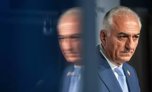 Reza Pahlavi, son of the former Iranian Shah, attends a press conference at the Munich Security Conference in Munich, Germany, Saturday Feb. 14, 2026. (Marijan Murat/dpa via AP)