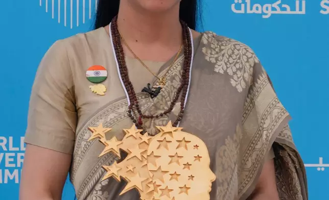 Indian teacher Rouble Nagi poses for a photograph after receiving the Global Teacher Prize at a ceremony in Dubai, United Arab Emirates, Thursday, Feb. 5, 2026. (AP Photo/Altaf Qadri)