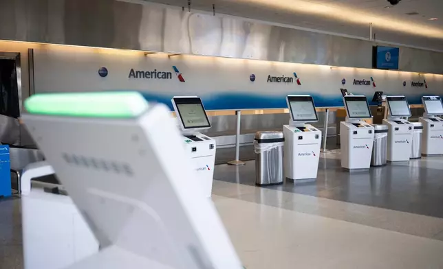 An American Airlines gate is closed at the Philadelphia International Airport on Monday, Feb. 23, 2026 in Philadelphia. (AP Photo/Joe Lamberti)