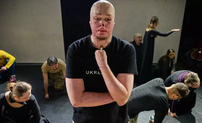 Yehor Babenko, a war veteran who sustained severe injuries in combat during Russia's full-scale invasion in Ukraine, performs during rehearsal in Kyiv, Ukraine, Wednesday, Feb. 18, 2026. (AP Photo/Efrem Lukatsky)