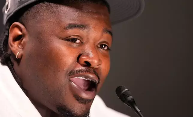Seattle Seahawks defensive tackle Jarran Reed speaks during the NFL Super Bowl Opening Night, Monday, Feb. 2, 2026, in San Jose, Calif., ahead of the Super Bowl 60 football game between the Seattle Seahawks and the New England Patriots. (AP Photo/Charlie Riedel)