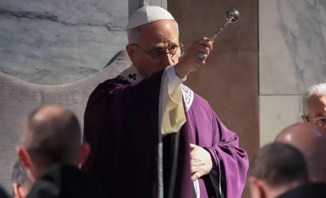 Pope Leo XIV blesses the ashes during Ash Wednesday Mass, marking the start of Catholic Lent, inside the Basilica of Santa Sabina in Rome, Wednesday, Feb. 18, 2026. (AP Photo/Gregorio Borgia)