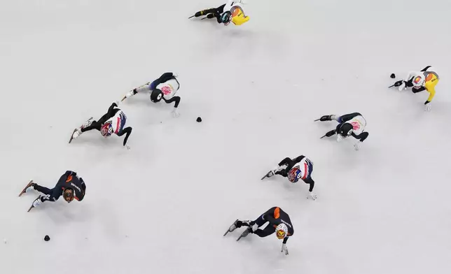 Team Netherlands leads the men's 5000m relay short track speed skating followed by South Korea, Japan and Belgium at the 2026 Winter Olympics, in Milan, Italy, Monday, Feb. 16, 2026. (AP Photo/Bernat Armangue)