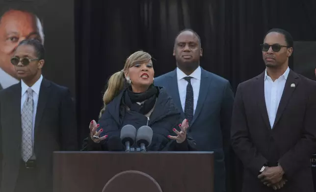Santita Jackson speaks during a news conference regarding the death of her father, the Rev. Jesse Jackson, outside the family home Wednesday, Feb. 18, 2026, in Chicago. (AP Photo/Erin Hooley)