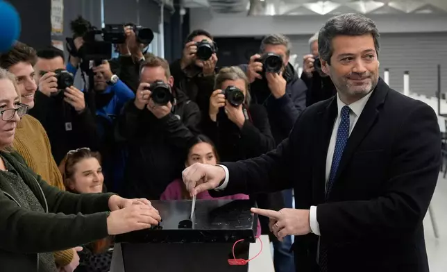 Presidential candidate Andre Ventura, of the populist Chega party, casts his ballot in Portugal's presidential election in Lisbon, Sunday, Feb. 8, 2026. (AP Photo/Ana Brigida)
