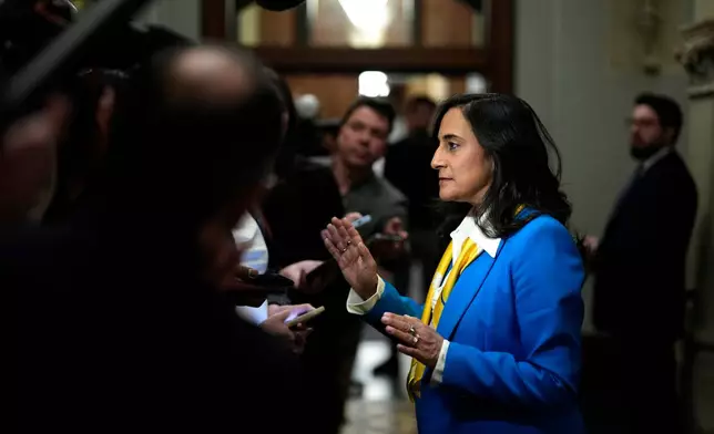 Minister of Foreign Affairs Anita Anand speaks as she arrives for a meeting of the federal cabinet, in Ottawa, on Tuesday, Feb. 24, 2026. (Justin Tang /The Canadian Press via AP)