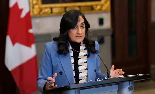 Canada Minister of Foreign Affairs Anita Anand speaks at a news conference regarding the security situation in Mexico, in the Foyer of the House of Commons on Parliament Hill in Ottawa, on Monday, Feb. 23, 2026. (Justin Tang/The Canadian Press via AP)