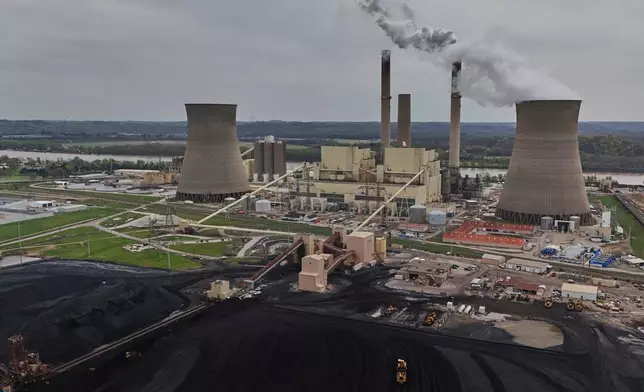 FILE - The Gen. James Gavin Power Plant, a coal-fired power plant, operates April 14, 2025, in Cheshire, Ohio. (AP Photo/Joshua A. Bickel, File)