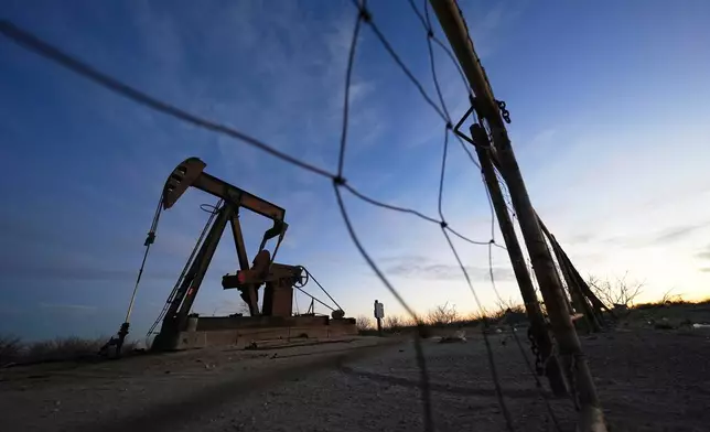 FILE - A pumpjack is visible before sunrise Feb. 26, 2025, in Kermit, Texas. (AP Photo/Julio Cortez, File)