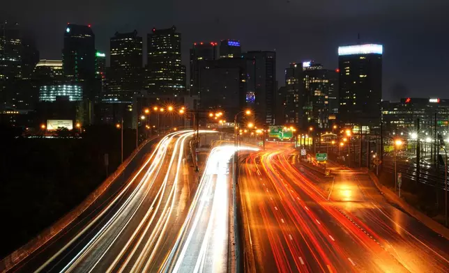 FILE - Traffic moves along Interstate 76 ahead of the Memorial Day holiday weekend, in Philadelphia, May 22, 2025. (AP Photo/Matt Rourke, File)
