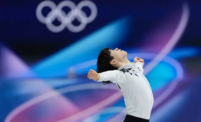 Yuma Kagiyama of Japan competes during the figure skating men's team event at the 2026 Winter Olympics, in Milan, Italy, Saturday, Feb. 7, 2026. (AP Photo/Natacha Pisarenko)