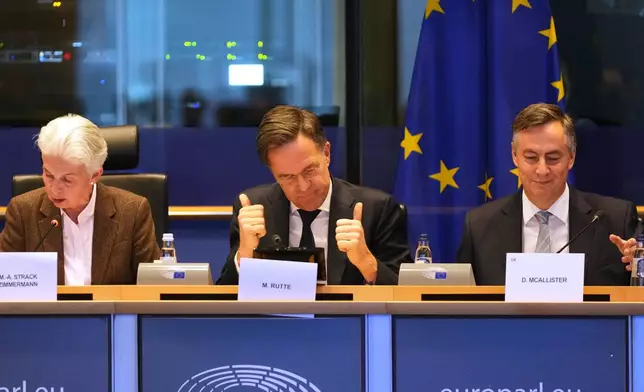 NATO Secretary General Mark Rutte, center, addresses the Security and Defence Committee at the European Parliament in Brussels, Monday, Jan. 26, 2026. (AP Photo/Virginia Mayo)