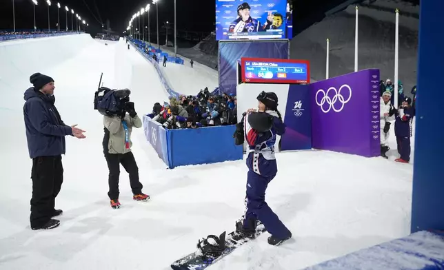 United States' Chloe Kim reacts after her second run during the women's snowboarding halfpipe finals at the 2026 Winter Olympics, in Livigno, Italy, Thursday, Feb. 12, 2026. (AP Photo/Lindsey Wasson)