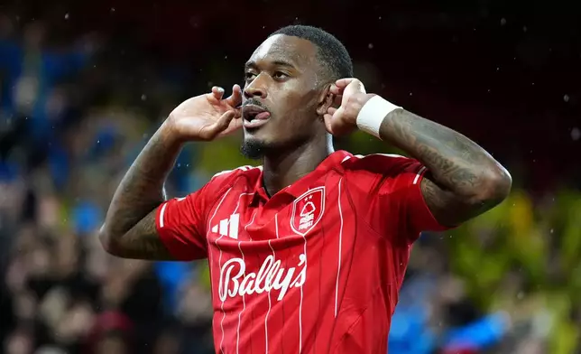 Nottingham Forest's Callum Hudson-Odoi celebrates scoring during the Europa League knockout phase play-off second leg match between Nottingham Forest and Fenerbahce in Nottingham, England, Thursday Feb. 26, 2026. (Mike Egerton/PA via AP)