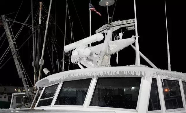 Ice coats radar instruments on a fishing boat up in Gloucester, Mass., the home port of a vessel that that went missing at sea with seven people aboard, Friday, Jan. 30, 2026. (AP Photo/Robert F. Bukaty)