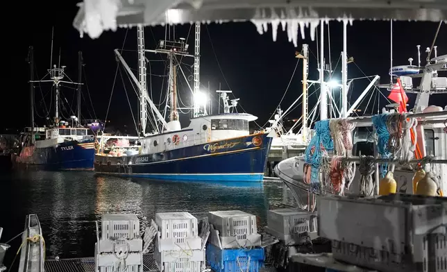 Fishing boats are tied up in Gloucester, Mass., the home port of a vessel that that went missing at sea with seven people aboard, Friday, Jan. 30, 2026. (AP Photo/Robert F. Bukaty)