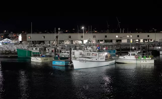 Fishing boats are tied up in Gloucester, Mass., the home port of a vessel that that went missing at sea with seven people aboard, Friday, Jan. 30, 2026. (AP Photo/Robert F. Bukaty)