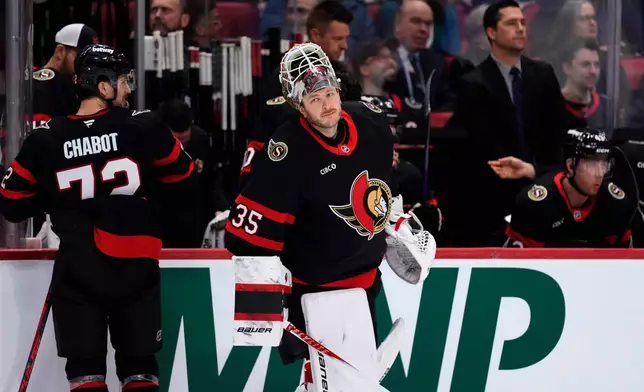 Ottawa Senators goaltender Linus Ullmark (35) heads to the net before the first period of an NHL hockey game in Ottawa, on Saturday, Jan. 31, 2026. (Justin Tang/The Canadian Press via AP)