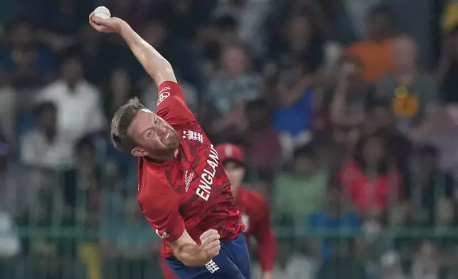 England's Liam Dawson bowls a delivery during the T20 World Cup cricket match between England and New Zealand in Colombo, Sri Lanka, Friday, Feb. 27, 2026. (AP Photo/Eranga Jayawardena)