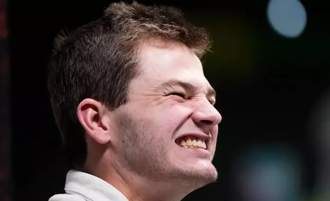 New England Patriots quarterback Drake Maye laughs during the NFL Super Bowl Opening Night, Monday, Feb. 2, 2026, in San Jose, Calif. ahead of the Super Bowl 60 football game between the New England Patriots and the Seattle Seahawks. (AP Photo/Brynn Anderson)