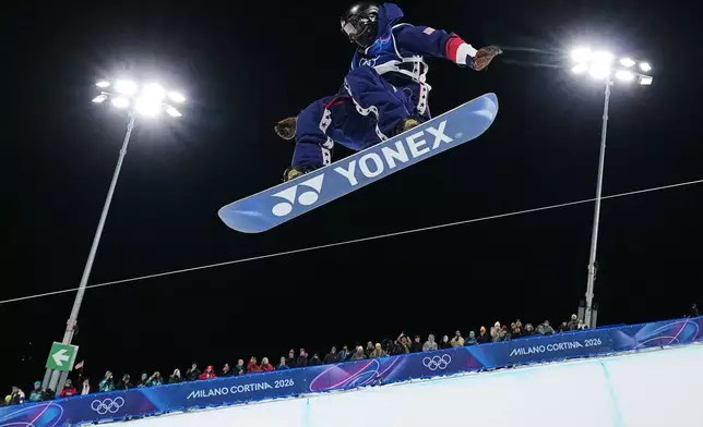 United States' Alessandro Barbieri competes during the men's snowboarding halfpipe qualifications at the 2026 Winter Olympics, in Livigno, Italy, Wednesday, Feb. 11, 2026. (AP Photo/Gregory Bull)