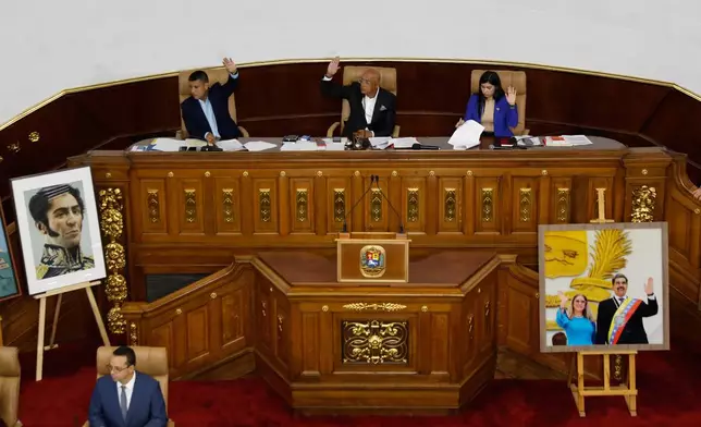National Assembly President Jorge Rodriguez, center, presides over a session debating an amnesty bill in Caracas, Venezuela, Thursday, Feb. 19, 2026. (AP Photo/Crisitian Hernandez)