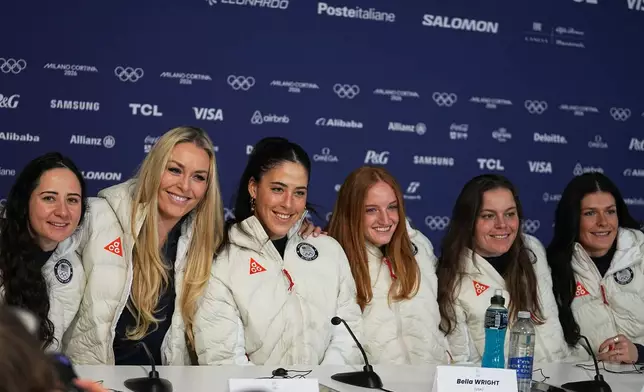 United States' Jackie Wiles, Lindsey Vonn, Isabella Wright, Mary Bocock and Breezy Johnson, from left, attend a press conference by the U.S. ski team at the 2026 Winter Olympics, in Cortina d'Ampezzo, Italy, Tuesday, Feb. 3, 2026. (AP Photo/Fatima Shbair)