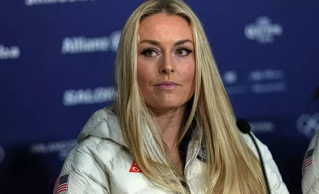 United States' Lindsey Vonn attends a press conference by the U.S. ski team at the 2026 Winter Olympics, in Cortina d'Ampezzo, Italy, Tuesday, Feb. 3, 2026. (AP Photo/Fatima Shbair)
