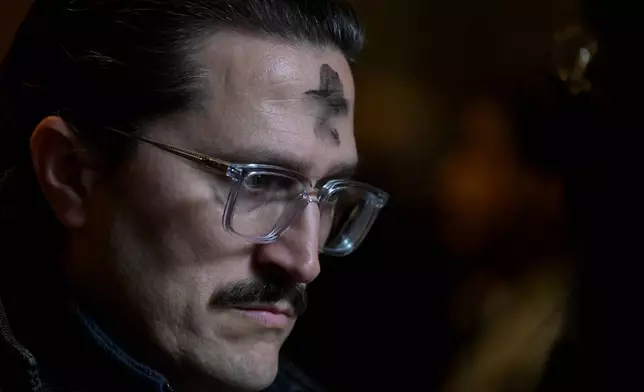 Parishioners depart following an Ash Wednesday Mass at the Cathedral of St. Matthew the Apostle, Wednesday, Feb., 18, 2026, in Washington. (AP Photo/Rod Lamkey, Jr.)