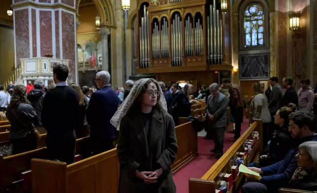 Ella Morone receives ashes during an Ash Wednesday Mass at the Cathedral of St. Matthew the Apostle, Wednesday, Feb., 18, 2026, in Washington. (AP Photo/Rod Lamkey, Jr.)