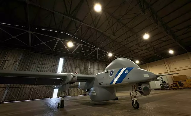 A Frontex HERON2 UAV drone is parked at Tympaki airport on Crete island, Greece, Tuesday, Feb. 17, 2026. (AP Photo/Lefteris Pitarakis)