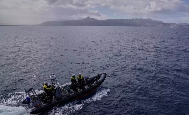 Frontex officers from the Italian Guardia Di Finanza OPV Osum patrol by speedboat on the Aegean Sea near Heraklion, Crete Island, Greece, Monday, Feb. 16, 2026. (AP Photo/Lefteris Pitarakis)