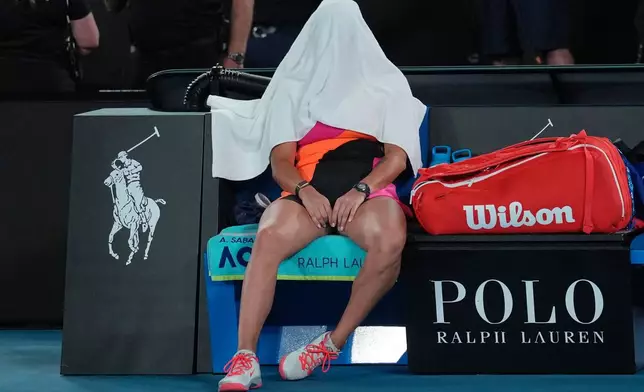 Aryna Sabalenka of Belarus reacts after losing to Elena Rybakina of Kazakhstan in the women's singles final at the Australian Open tennis championship in Melbourne, Australia, Saturday, Jan. 31, 2026. (AP Photo/Dita Alangkara)