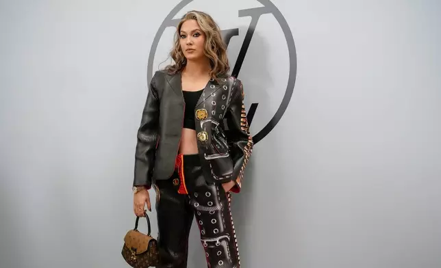 FILE - Eileen Gu attends the Louis Vuitton Fall/Winter 2023-2024 ready-to-wear collection presented, March 6, 2023 in Paris. (AP Photo/Christophe Ena, File)