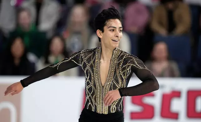 FILE - Donovan Carrillo of Mexico competes during the men's short program at the Skate America figure skating event in Allen, Texas, Oct. 19, 2024. (AP Photo/Tony Gutierrez, File)