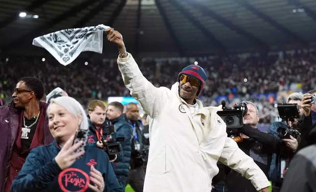 Swansea City co-owner Snoop Dogg ahead of the English Championship soccer match between Swansea City and Preston in Swansea, Wales, Tuesday, Feb. 24, 2026. (Jacob King/PA via AP)