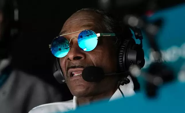 Snoop Dogg attends a men's ice hockey quarterfinal game between the United States and Sweden at the 2026 Winter Olympics, in Milan, Italy, Wednesday, Feb. 18, 2026. (AP Photo/Hassan Ammar)