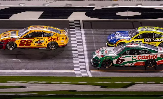 Joey Logano, (22) wins during the first of two NASCAR Daytona 500 qualifying auto races at Daytona International Speedway, Thursday, Feb. 12, 2026, in Daytona Beach, Fla. (AP Photo/Mike Stewart)