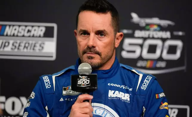 Casey Mears speaks during a NASCAR Daytona 500 media day, Wednesday, Feb. 11, 2026, in Daytona, Fla. (AP Photo/Mike Stewart)