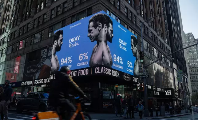 FILE - Advertisements by the American company Polymarket predict a victory for Zohran Mamdani in the New York City mayoral election, Nov. 4, 2025, in New York. (AP Photo/Olga Fedorova, File)