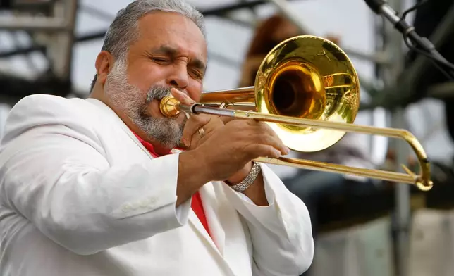 FILE - Singer and musician Willie Colon performs at The Climate Rally, an Earth Day concert, on the National Mall in Washington, April 25, 2010. Colón, considered by many to be the "architect of urban salsa," died Saturday, Feb. 21, 2026. He was 75. (AP Photo/Jacquelyn Martin, File)